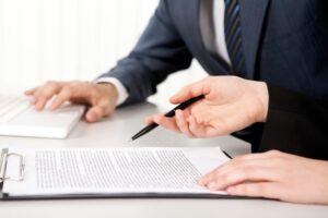 business lawyers looking over a contract